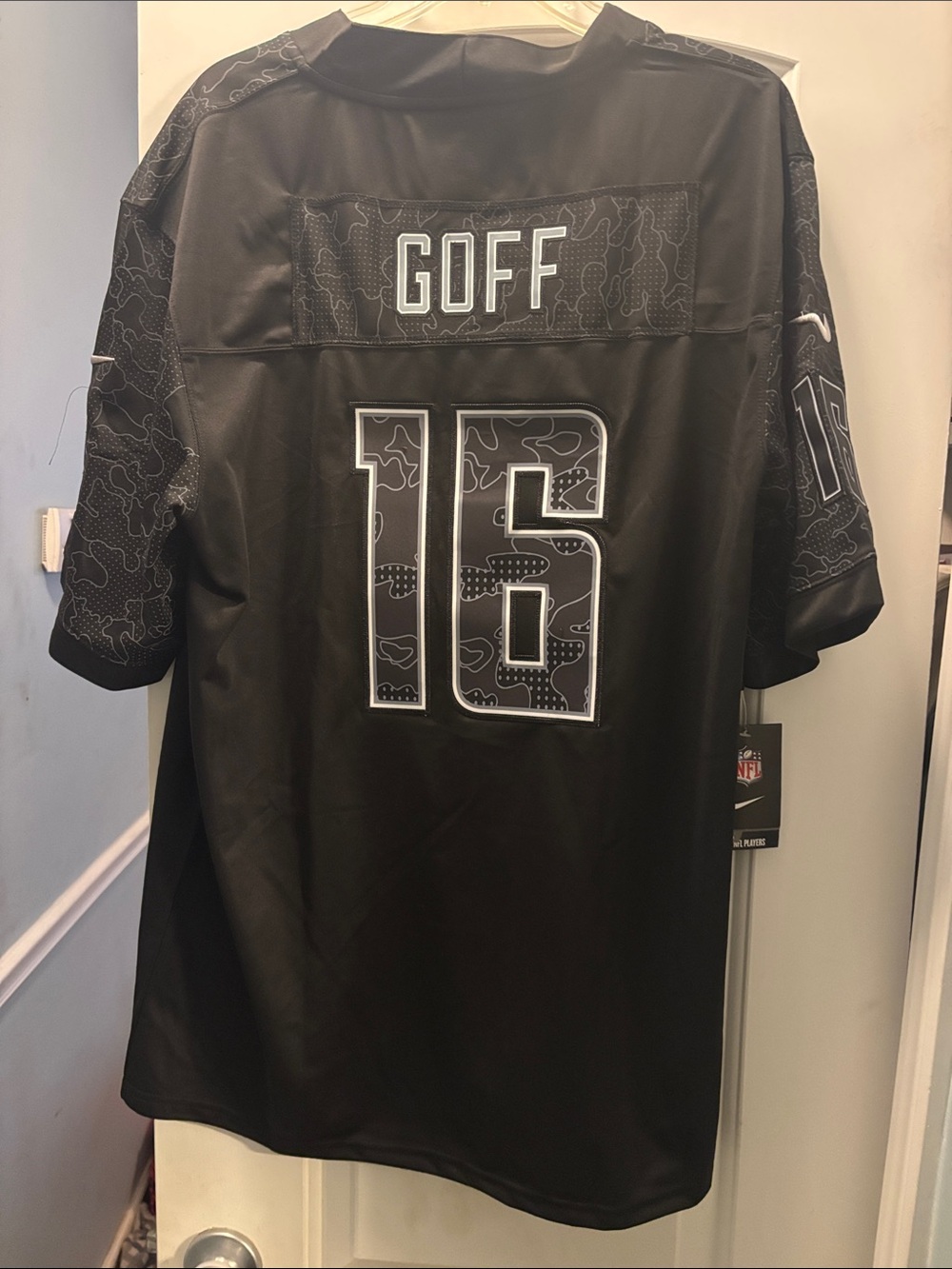 NFL Black Nike On-Field Tag Hanging from Jersey